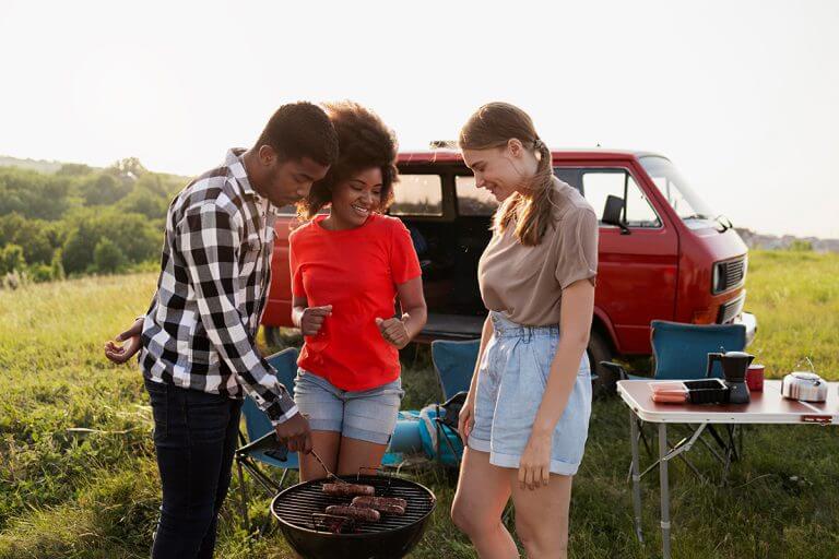 Friends preparing barbecue